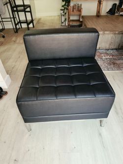 2 black faux learher accent chairs