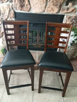 Two Wood Bar Stools with black leather seats