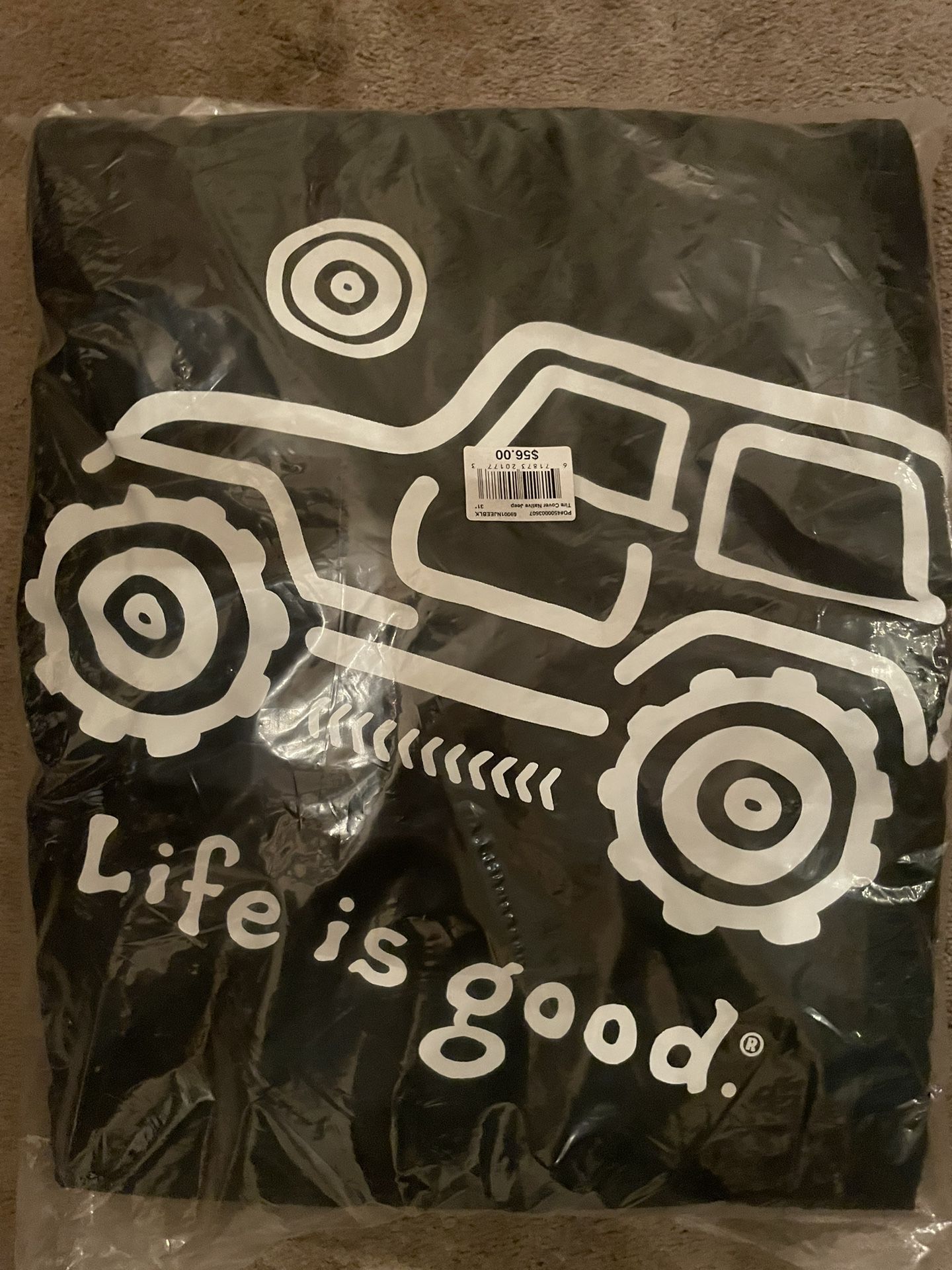 Brand New “Life Is Good” Jeep Tire Cover.