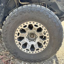 4 Toyo Mt Open Country With Black Rino Rims