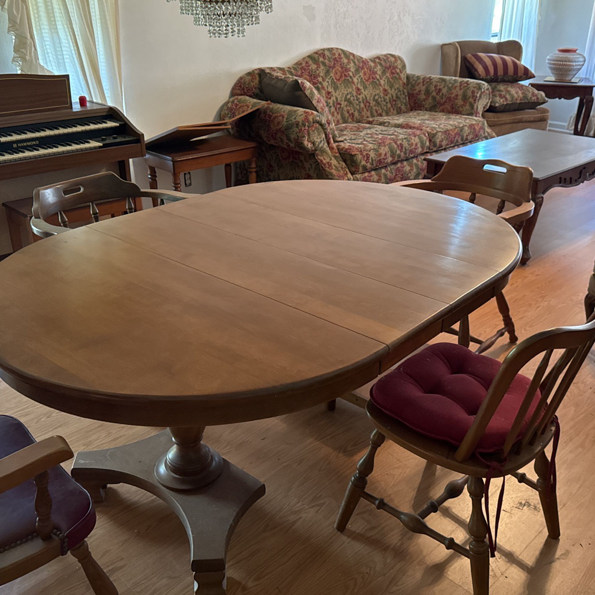a Dining table Solid wood like new, no scratches, has a special cover. with 6 chairs