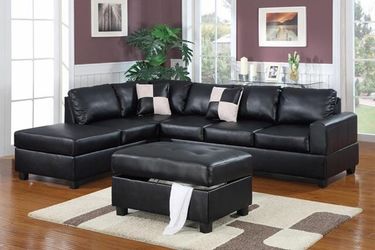 Black Leather Sectional and Ottoman