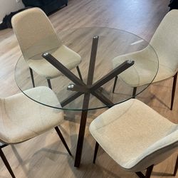 GLASS CIRCLE DINING TABLE