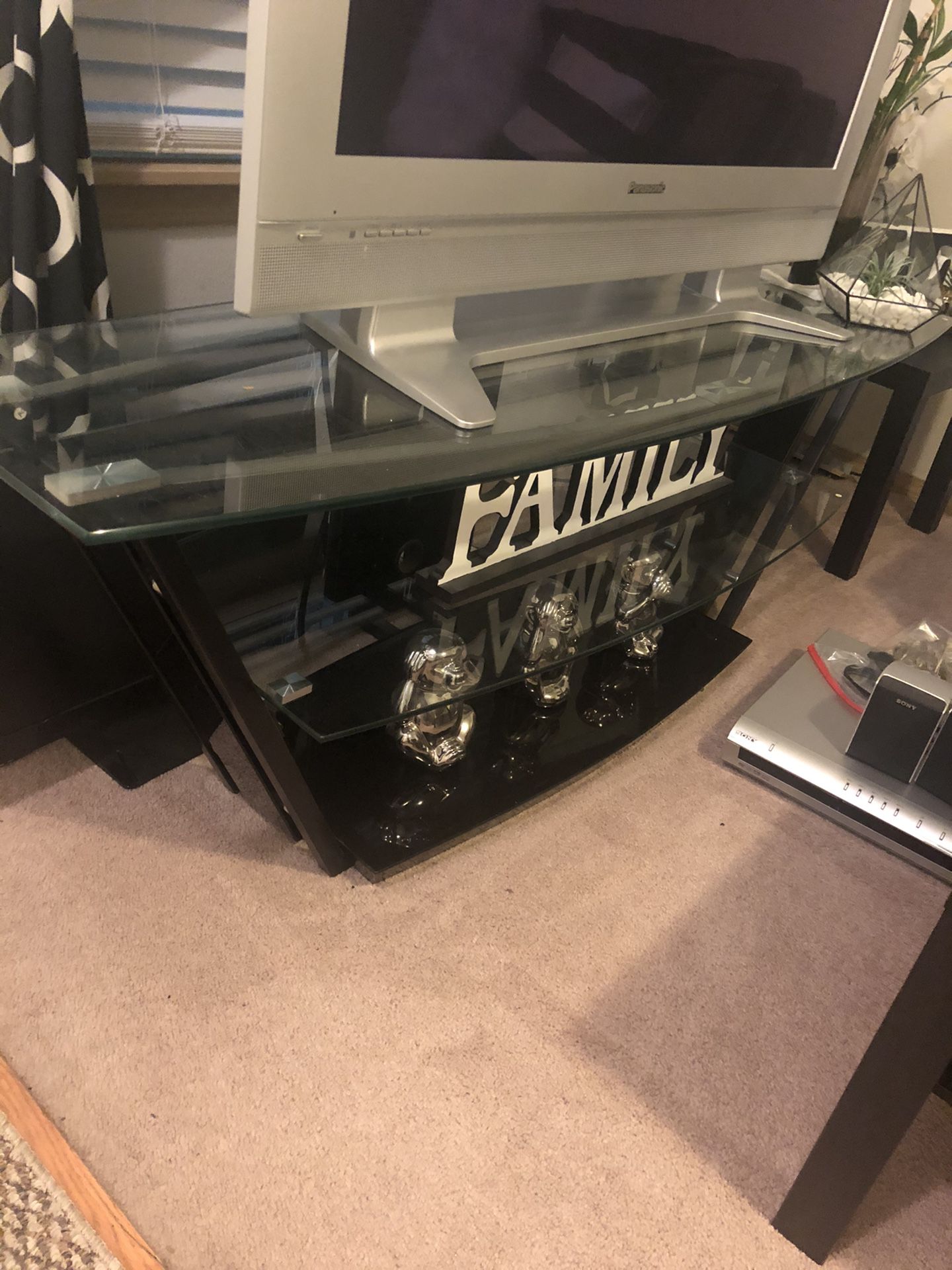 Nice glass TV stand comes with free older plasma tv