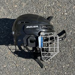 BAUERHOCKEY HELMET. UNEXPIRED