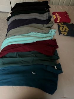 There is A 12 shirt the size is M and some is Large all of them for $150 total They are for man’s