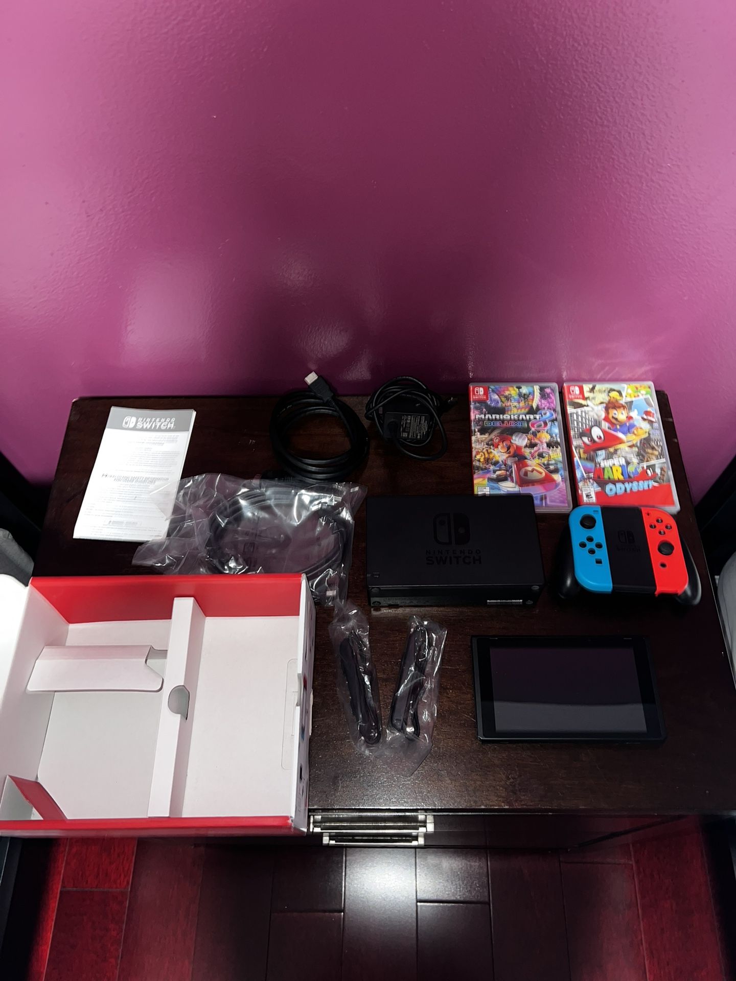 Nintendo Switch Console (Red/Blue Joy-Con) + 2 Games – Excellent Condition (comes with everything) 