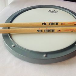 Remo Practice Pad And Vic Firth Drum Sticks