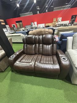 Brown Leather Loveseat  Automatic Recliner 