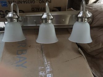 Lámpara de metal para baño nueva