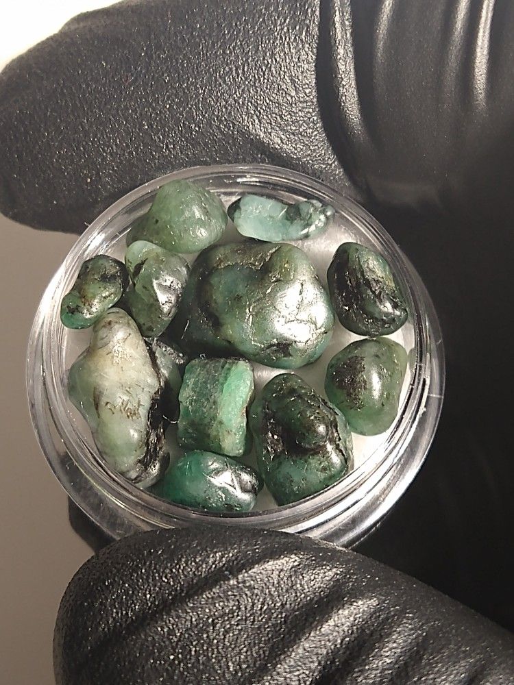 Natural Emeralds (Beryl) In a Display