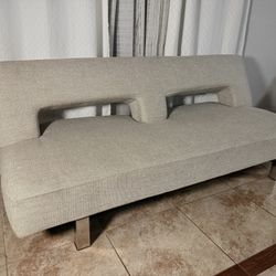 beige couch bed 