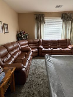 Brown leather sectional sofa couch with chaise lounger