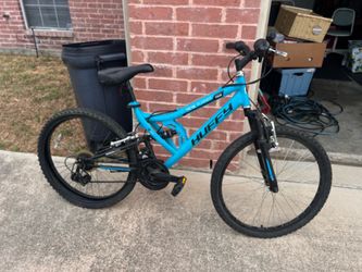 This is a Huffy 24" Trail Runner full-suspension mountain bike