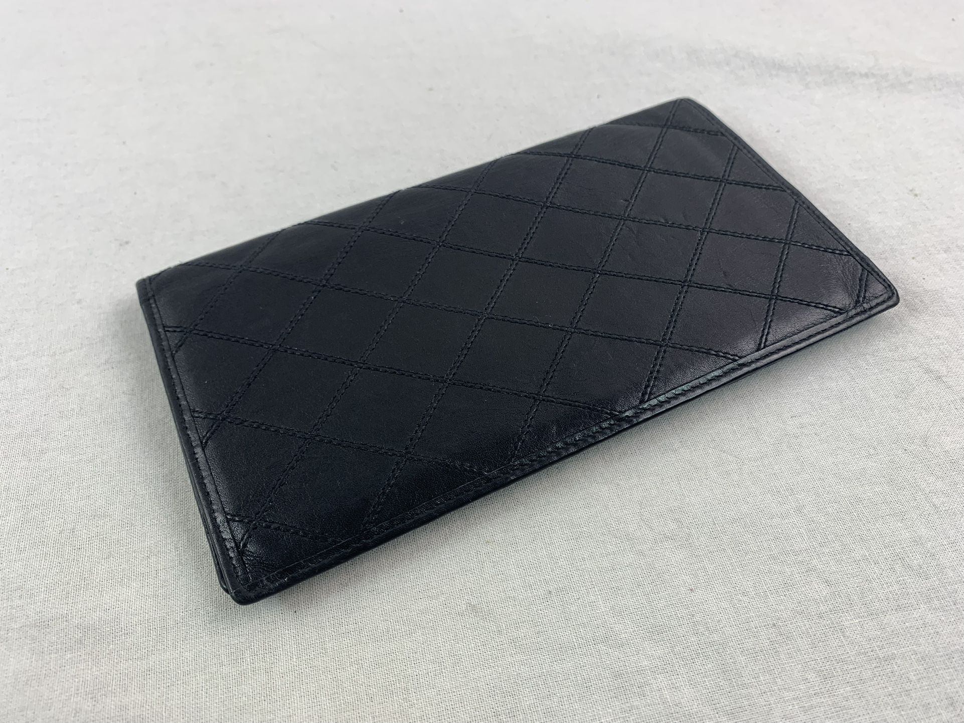 Authentic CHANEL Quilted Black Lamb Skin Leather Wallet. 