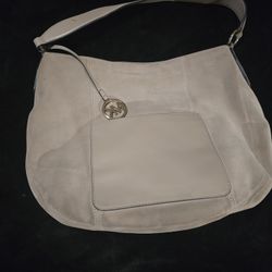 Michael kor's purse leatherlike.
