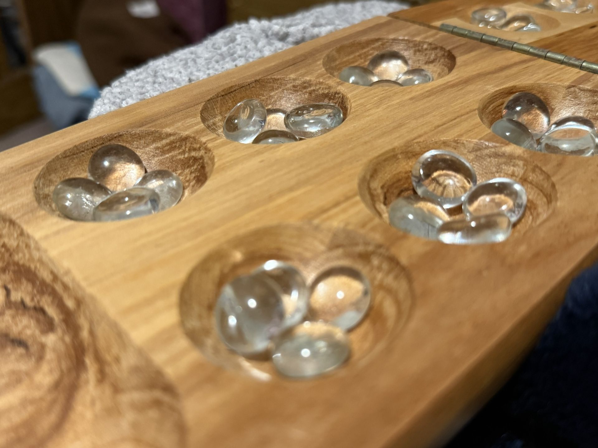 Wooden Mancala Board with clear marbles