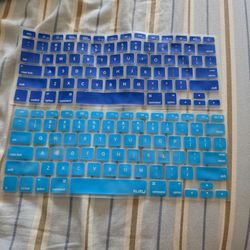 Two kuzy blue silicone MacBook keyboard cover