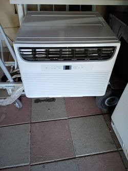 Frigidaire heater and air conditioning in one, aire acondicionado con calenton remote control wo