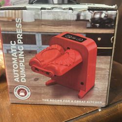 Automatic dumpling press