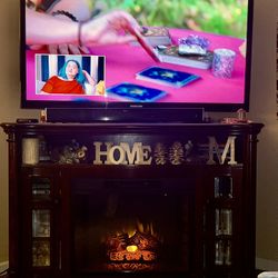 Fireplace Tv And Soundbar 