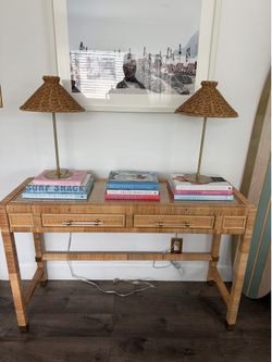 Wicker console table with matching wicker lamps