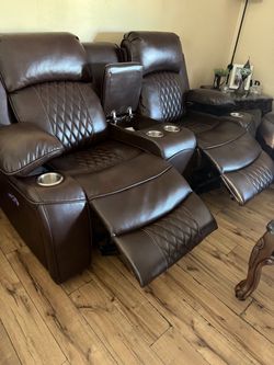 Beautiful brown leather ashley brand couches with  power reclining seats