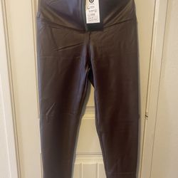 Wine-colored leather-style women's pants, Otos brand.