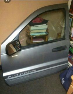 99 n up jeep grand cherokee dr side door $65