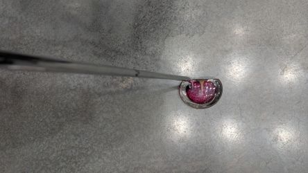 Glass putter signed by artist