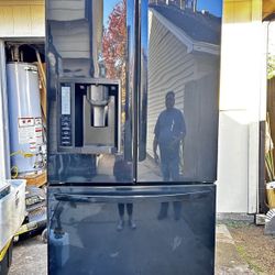 2 door bottom freezer black LG refrigerator.