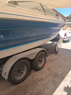 Trailer with boat