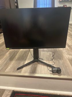 LG UltraGear 27GP750-B — 27” 1080p IPS, 240Hz, 1ms, G-SYNC Compatible / FreeSync Premium, with the height/tilt/pivot stand. It’s a 2021 model.