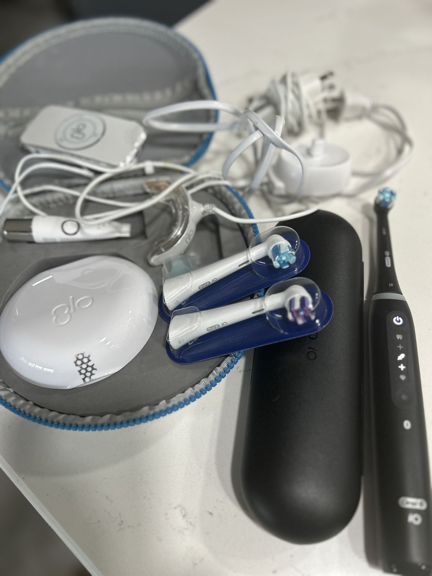 Teeth whitening system with electric toothbrush, and one extra brush