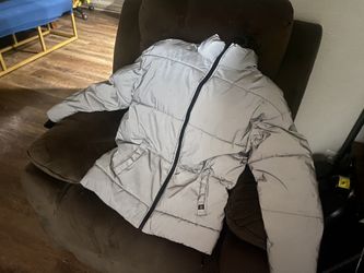 Nineth Hall Puffer Jacket That Reflects Light