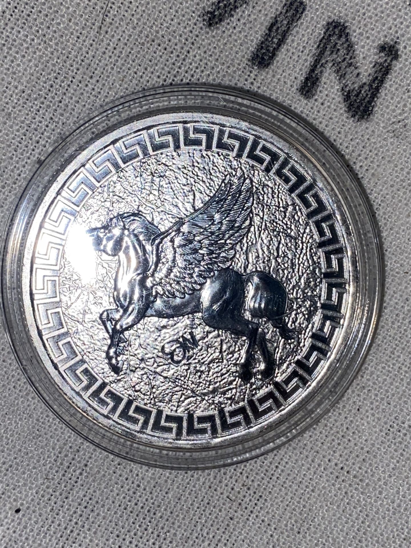 The "Remember The Alamo 1 Oz .999 Silver Round" is a silver bullion coin with a high level of purity at 0.999 fineness. This coin contains 1 ounce of