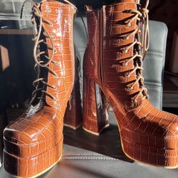 Brown new rock and roll high heels boots. Size: 7