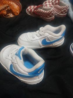 white and blue nikes