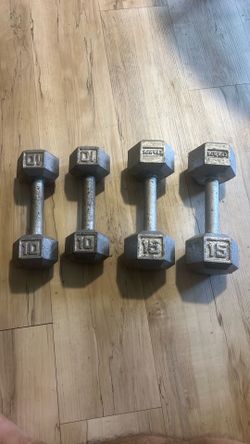 Two set of weights one 10lb set and a 15lb set