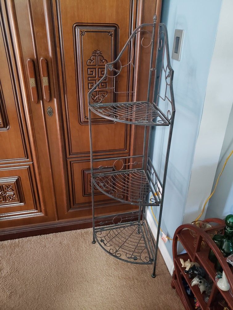 Three-tiered folding iron corner plant shelf unit