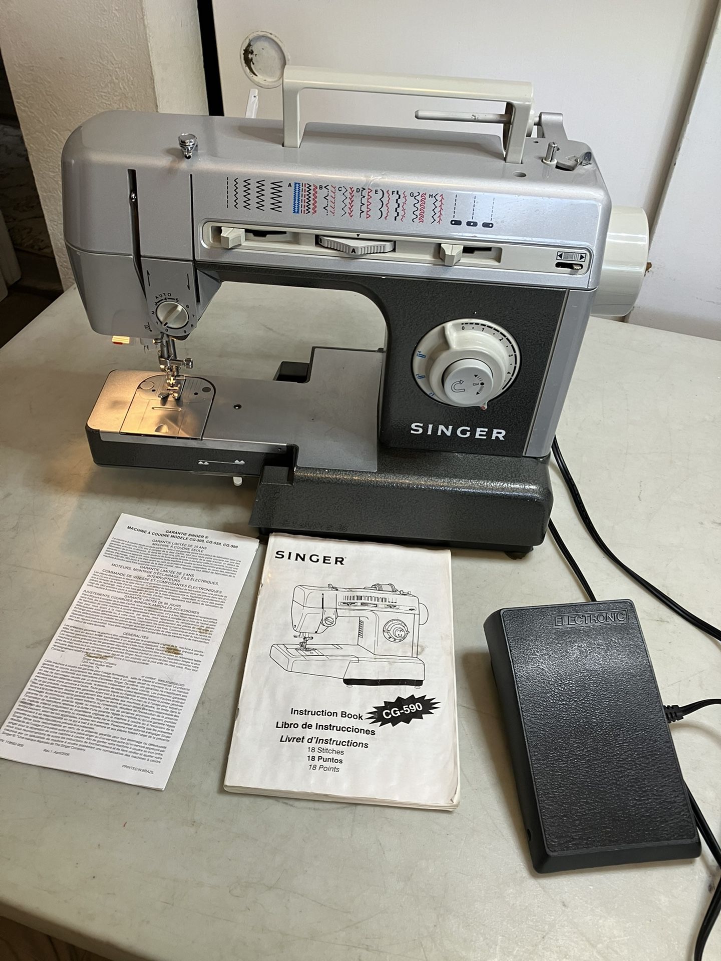Singer CG-590C Commercial Grade Heavy Duty Sewing Machine w/ Pedal I am not familiar with sewing machines but the light turns on, motor works, switc
