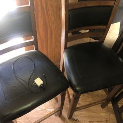 2 Wooden And Leather Chairs 