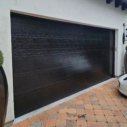 16x8 Flush Black Insulated Steelback Sectional Garage Door,$4500