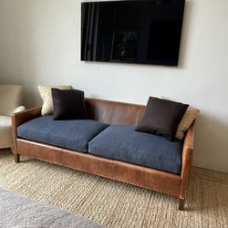 Leather Loveseat With Navy Linen Cushions