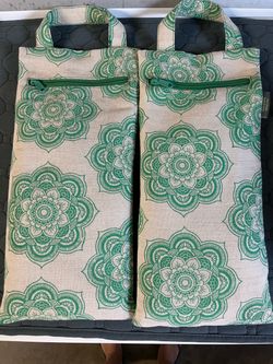 Two Yoga sand weight bags