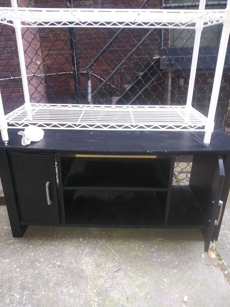 Excellent black TV stand with two doors