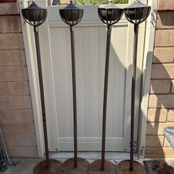 4 Solid Iron Tiki Torches. Copper Canister. 