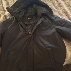 Guess men's water proof, fully lined jacket with a hood