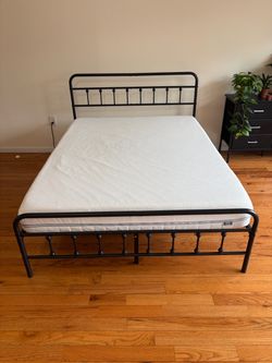 Queen mattress with frame like new