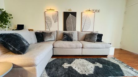 Modular reversible sectional sofa